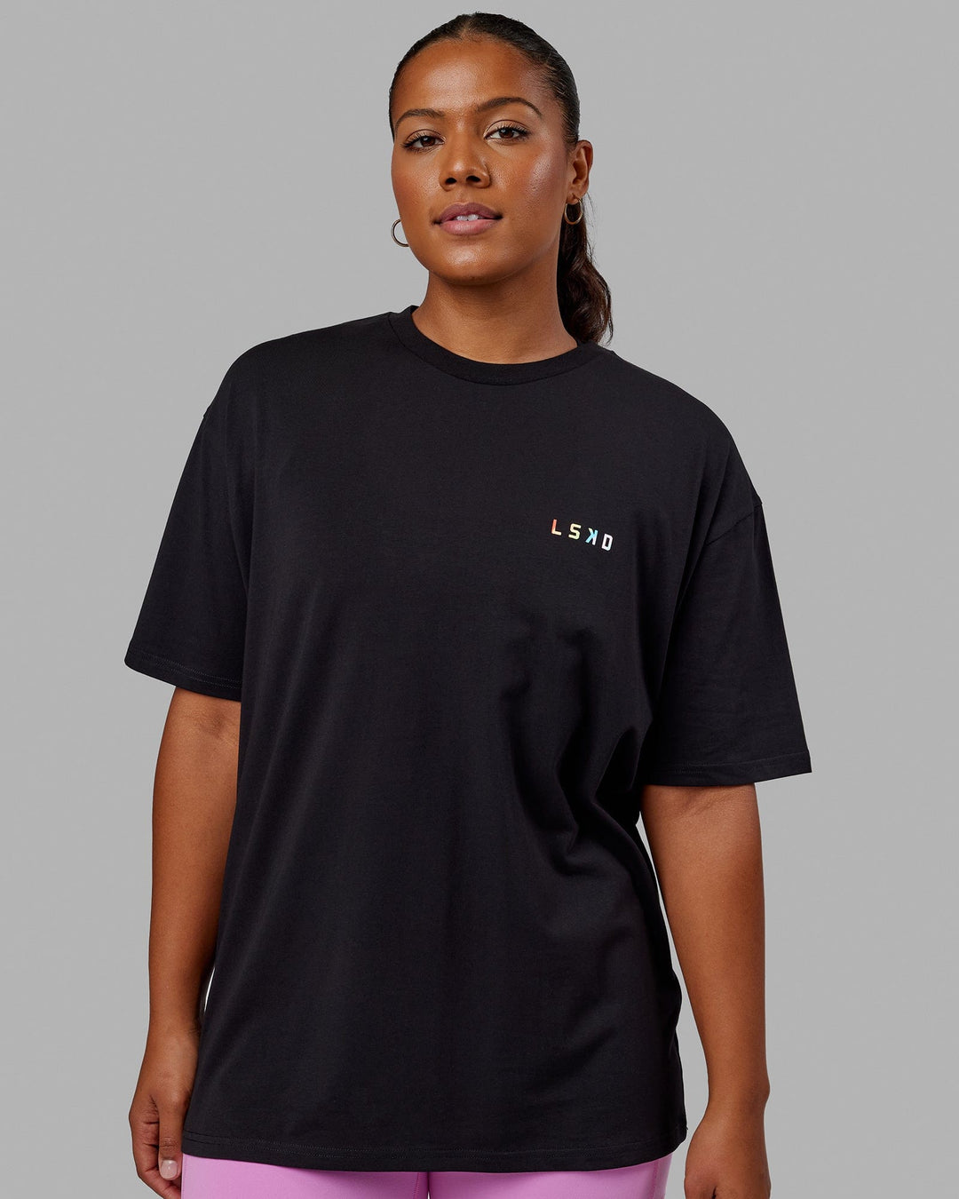 Woman wearing Unisex Amplify FLXCotton Tee Oversize - Black