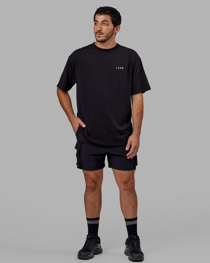 Man wearing Unisex Amplify FLXCotton Tee Oversize - Black