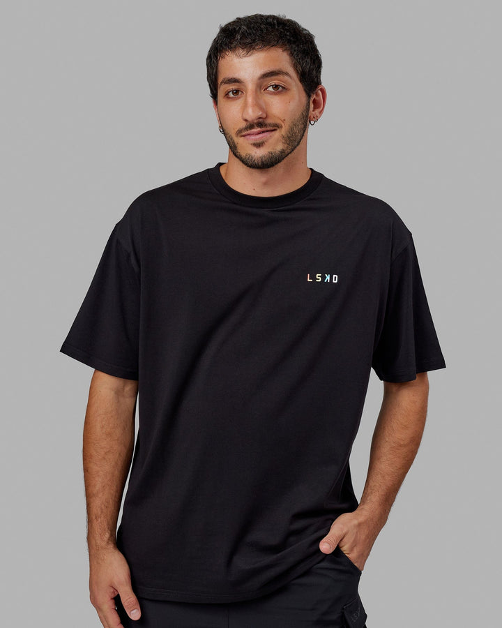 Man wearing Unisex Amplify FLXCotton Tee Oversize - Black