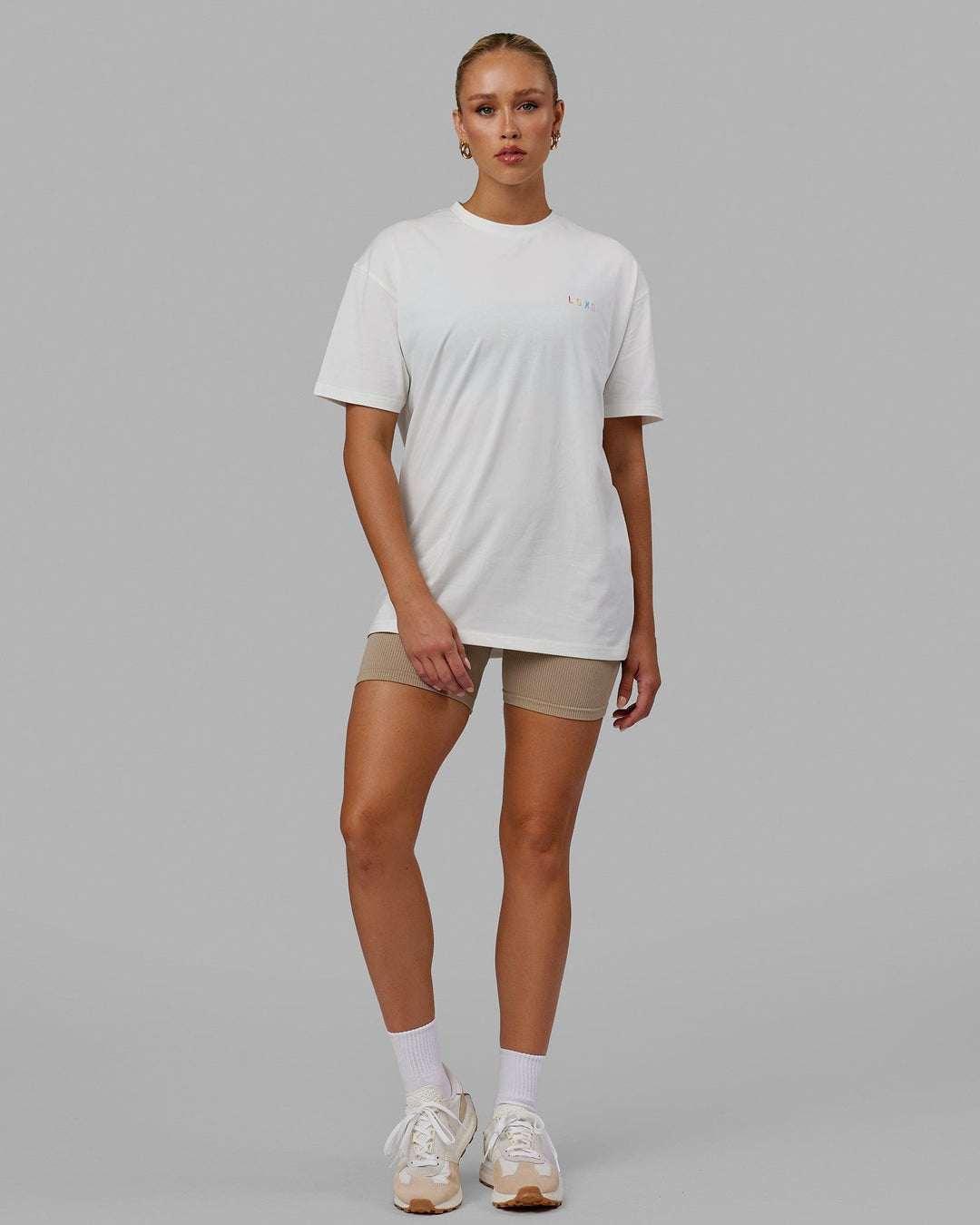 Woman wearing Unisex Amplify FLXCotton Tee Oversize - Off White
