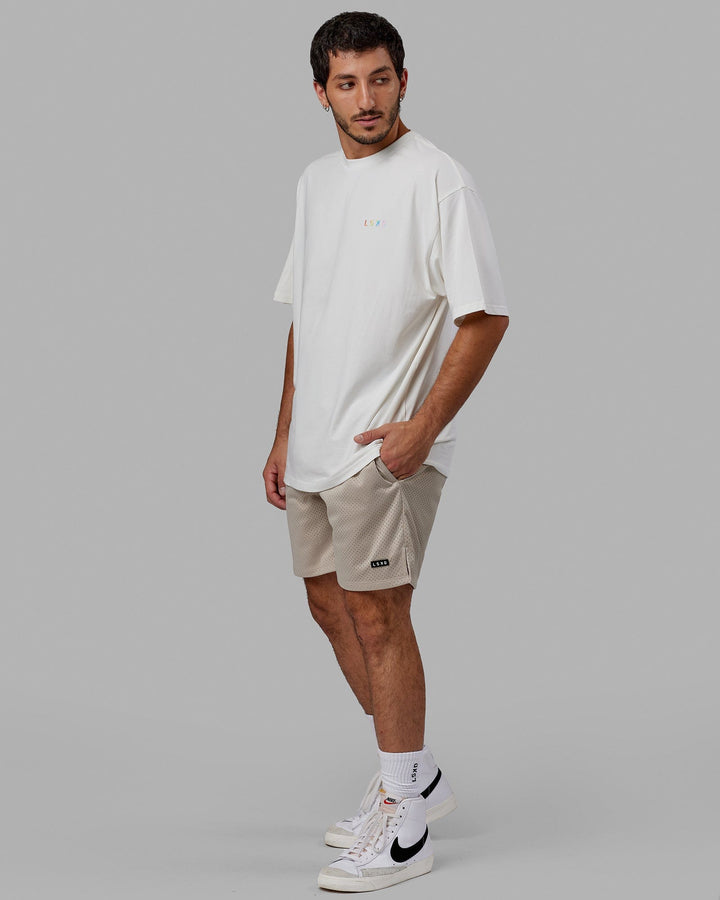 Man wearing Unisex Amplify FLXCotton Tee Oversize - Off White