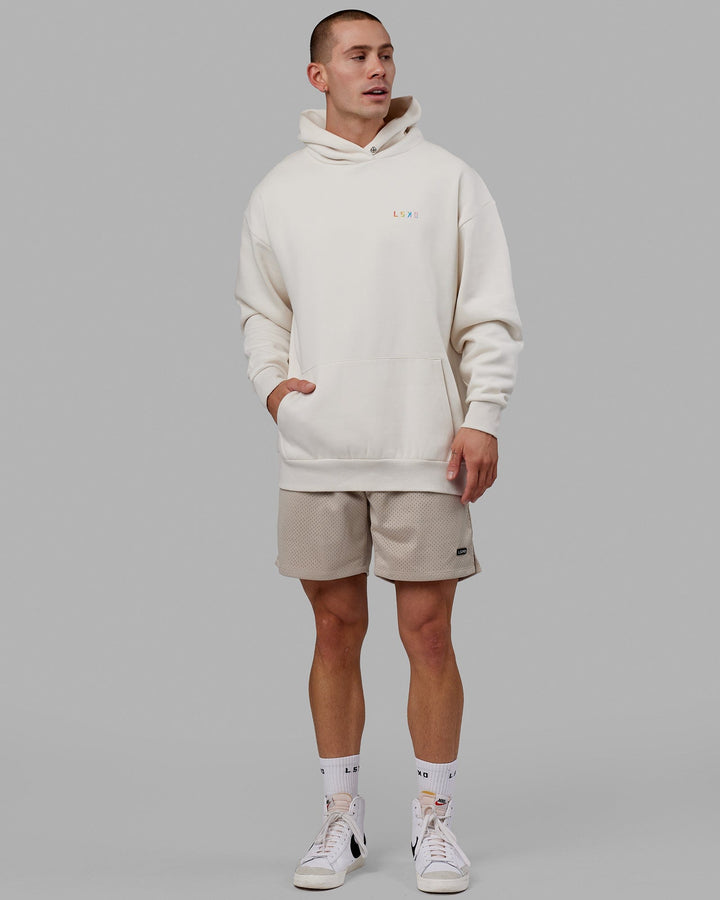 Man wearing Unisex Amplify Hoodie Oversize - Pride-Off White