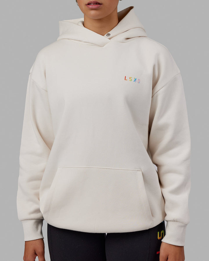 Woman wearing Unisex Amplify Hoodie Oversize - Pride-Off White