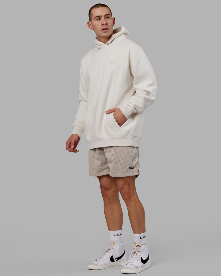 Man wearing Unisex Amplify Hoodie Oversize - Pride-Off White
