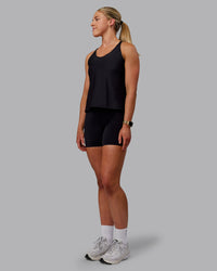 Woman wearing Apex Lightweight Performance Tank - Black | Thumbnail Index: 2