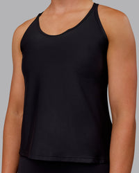 Woman wearing Apex Lightweight Performance Tank - Black | Thumbnail Index: 3