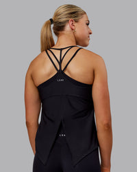 Woman wearing Apex Lightweight Performance Tank - Black | Thumbnail Index: 1