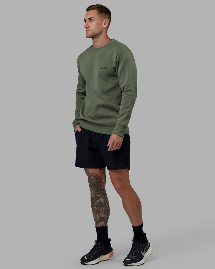 Man wearing Athlete ForgedFleece Sweater - Dark Forest