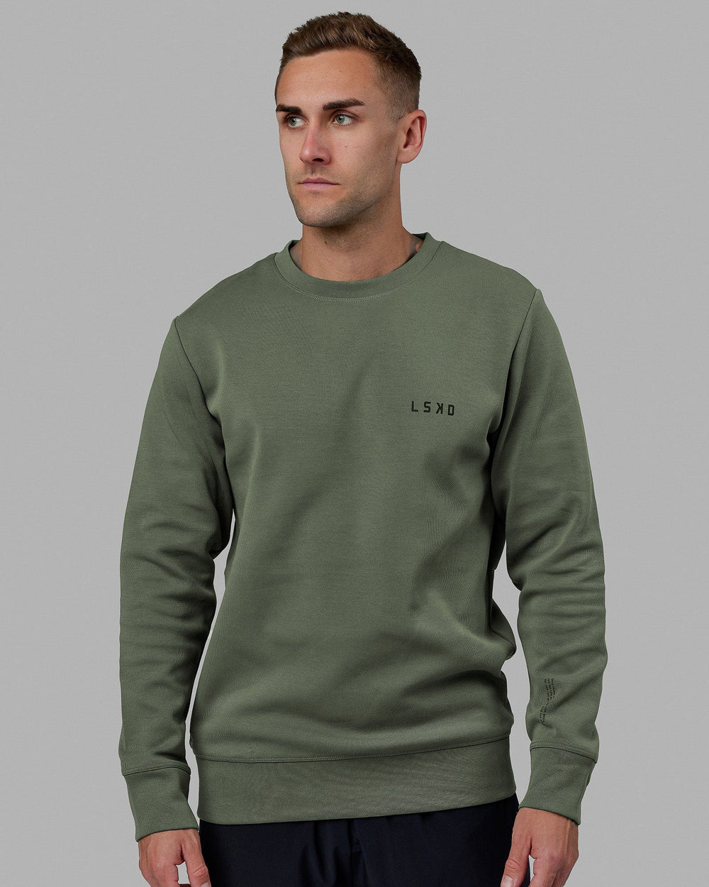 Man wearing Athlete ForgedFleece Sweater - Dark Forest