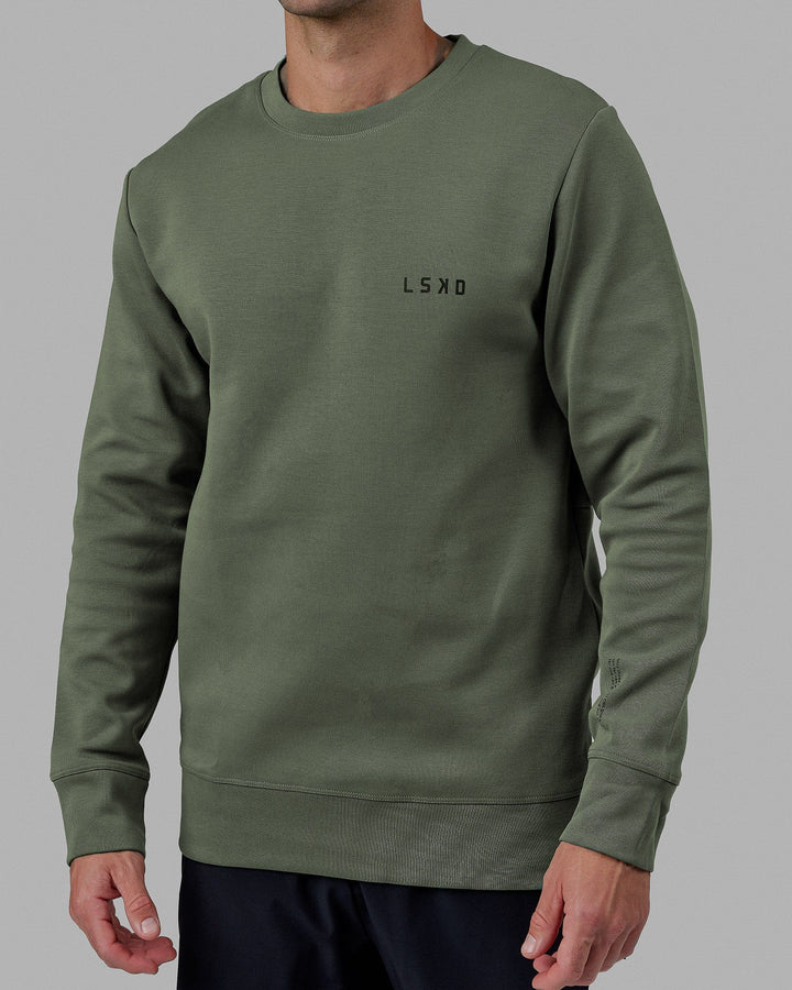 Man wearing Athlete ForgedFleece Sweater - Dark Forest
