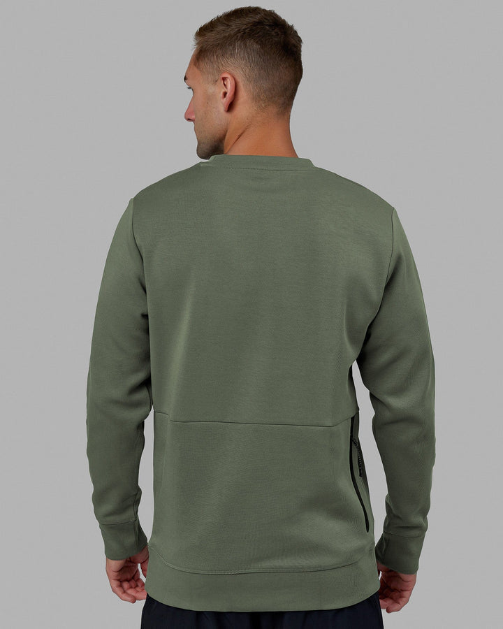 Man wearing Athlete ForgedFleece Sweater - Dark Forest