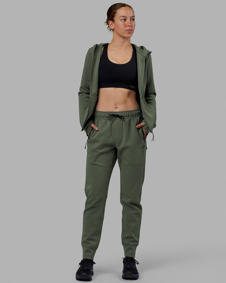 Woman wearing Womens Athlete ForgedFleece Track Pants - Dark Forest