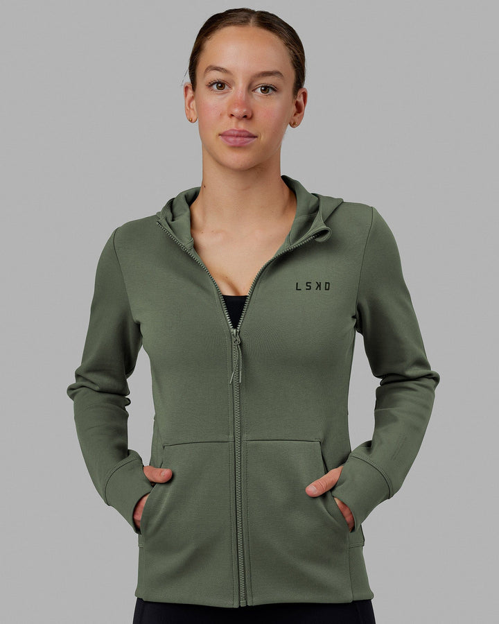 Woman wearing Athlete ForgedFleece Zip Through Hoodie - Dark Forest