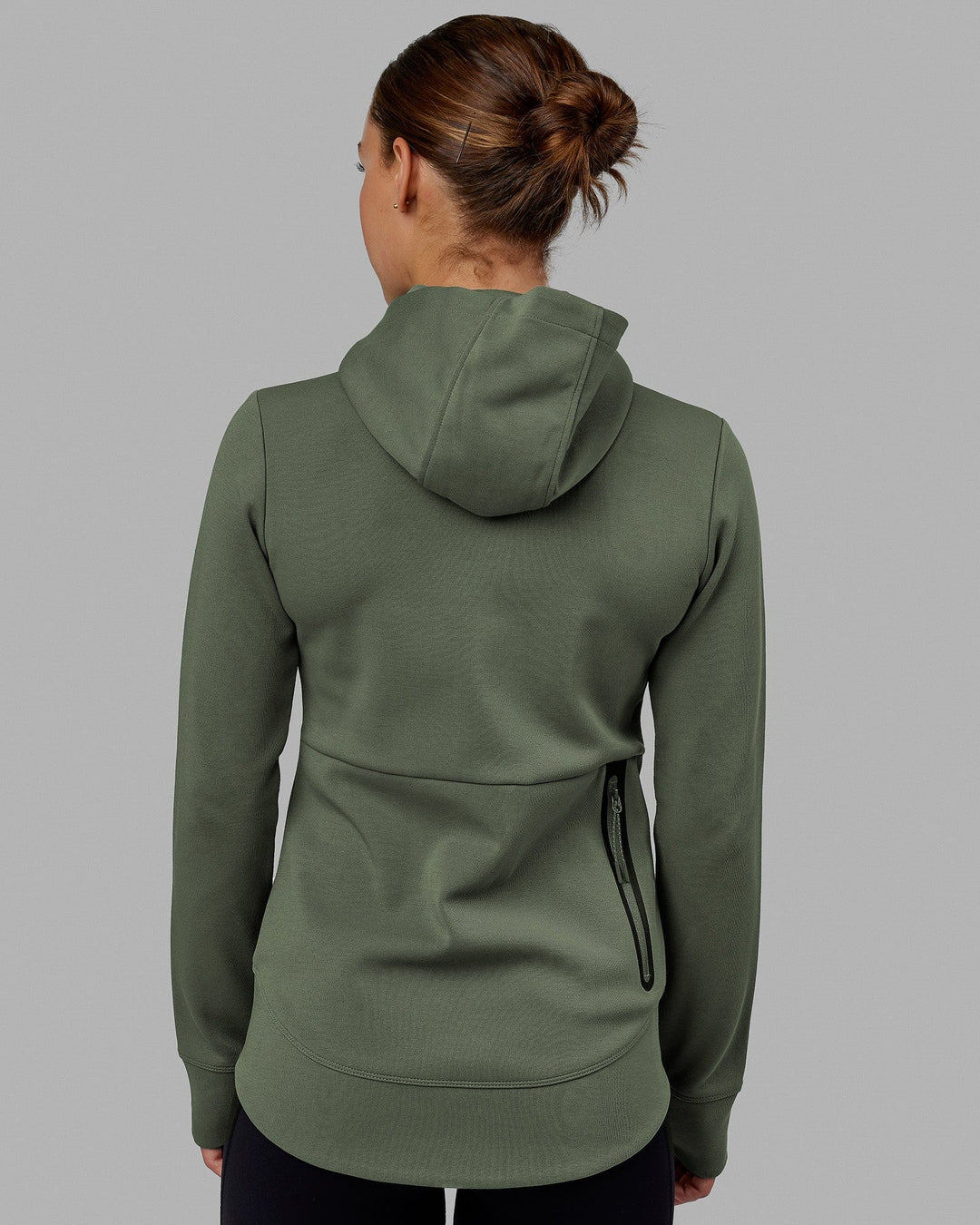 Woman wearing Athlete ForgedFleece Zip Through Hoodie - Dark Forest