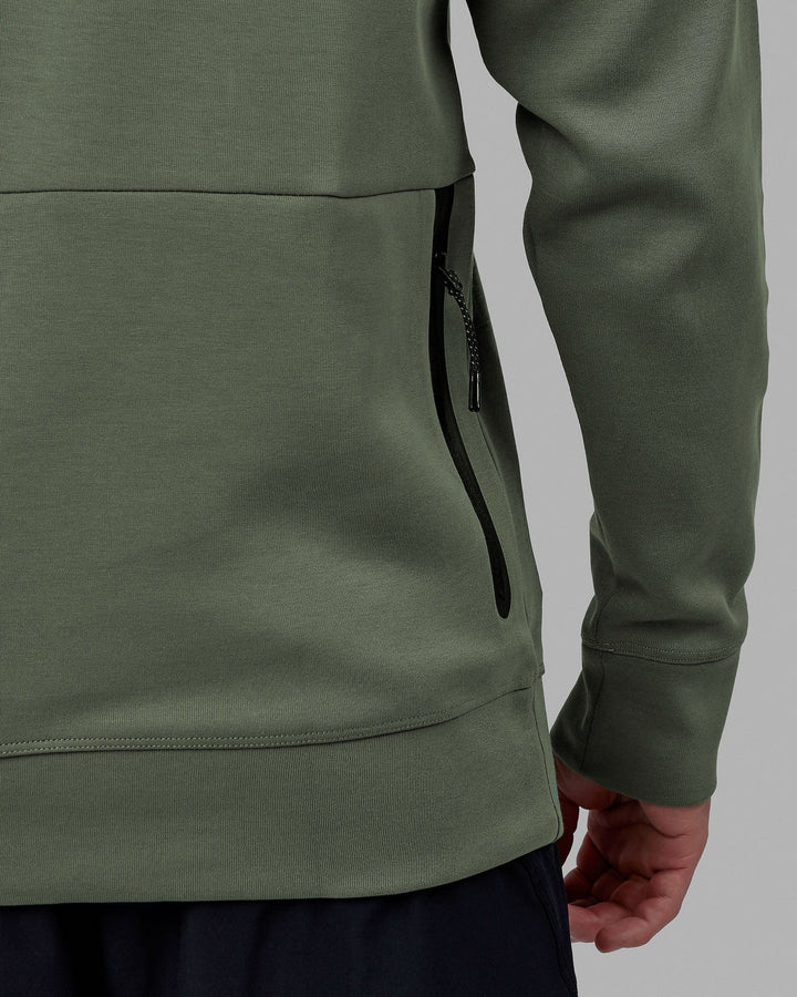 Man wearing Athlete ForgedFleece Zip Up Hoodie - Dark Forest
