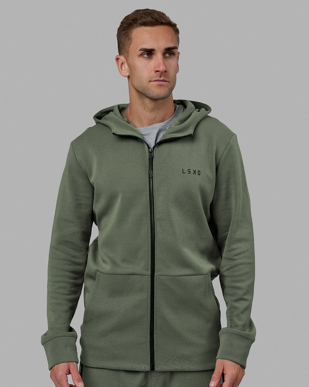 Man wearing Athlete ForgedFleece Zip Up Hoodie - Dark Forest