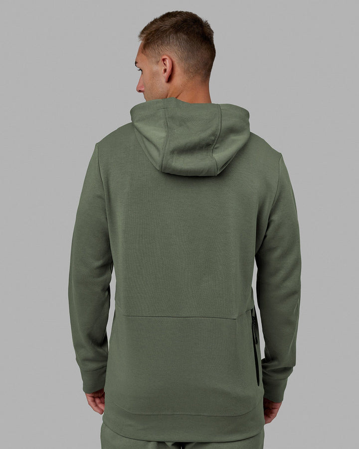 Man wearing Athlete ForgedFleece Zip Up Hoodie - Dark Forest