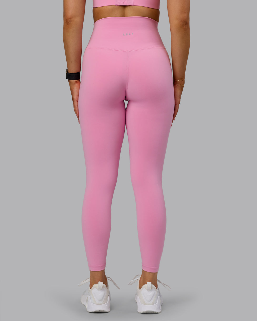 Woman wearing Base 2.0 Ultra High-Rise 7/8 Legging - Bubblegum