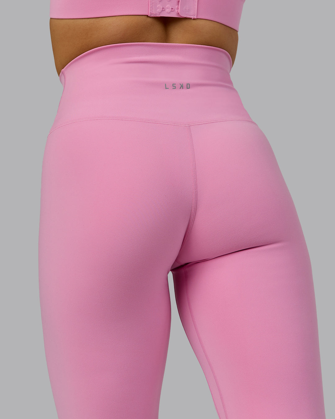 Woman wearing Base 2.0 Ultra High-Rise 7/8 Legging - Bubblegum