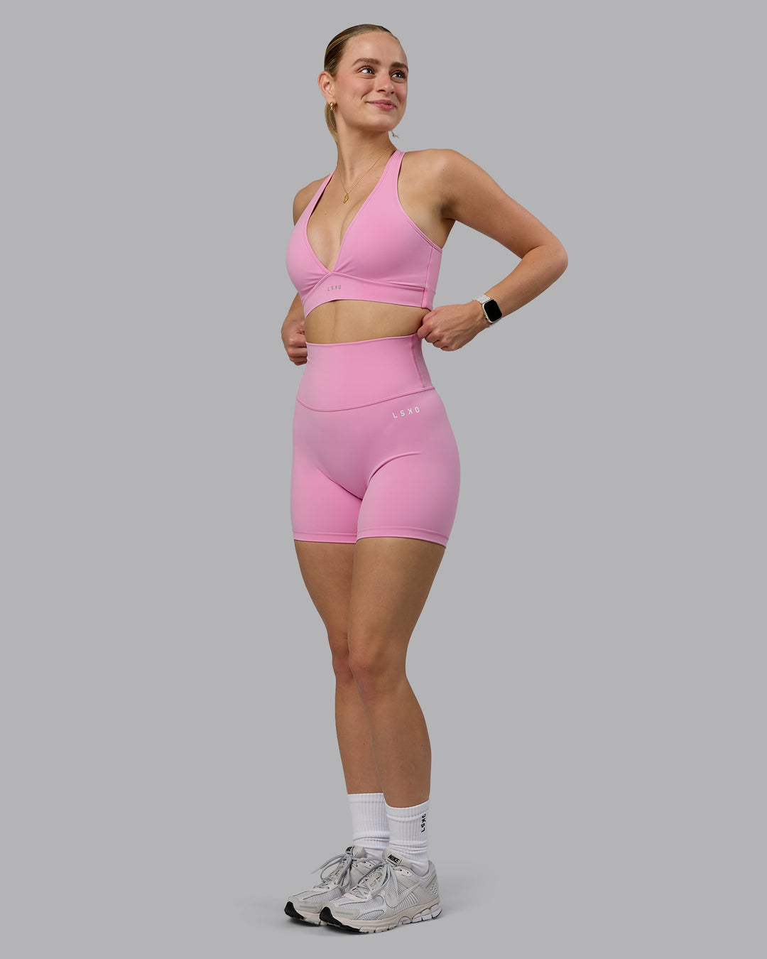 Woman wearing Base 2.0 Ultra High-Rise 6&quot; Short - Bubblegum