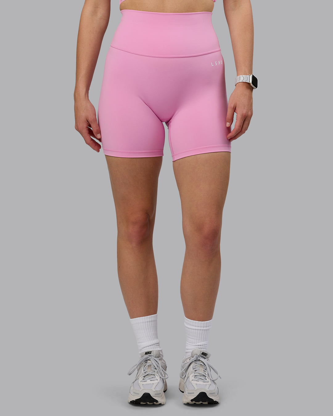 Woman wearing Base 2.0 Ultra High-Rise 6&quot; Short - Bubblegum