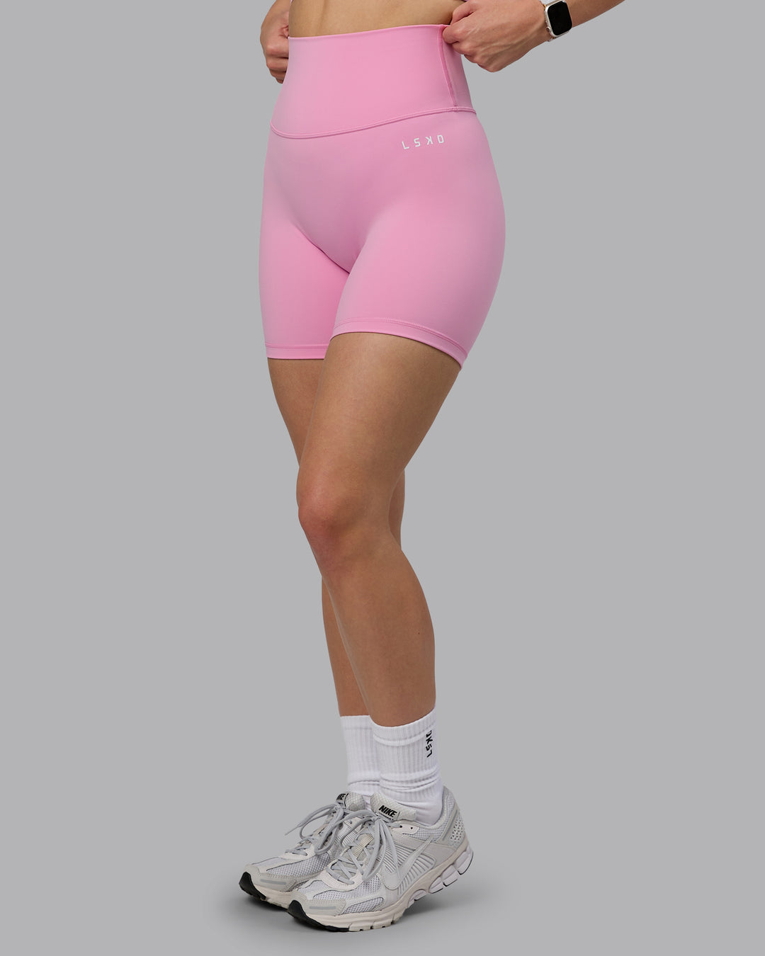 Woman wearing Base 2.0 Ultra High-Rise 6" Short - Bubblegum