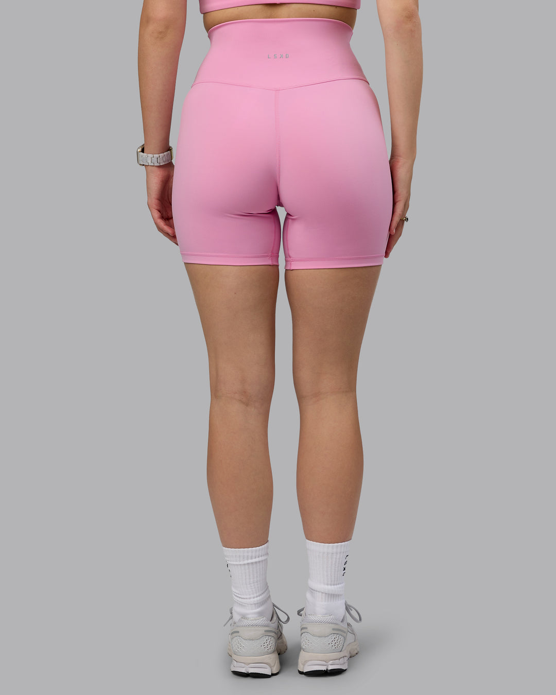 Woman wearing Base 2.0 Ultra High-Rise 6&quot; Short - Bubblegum