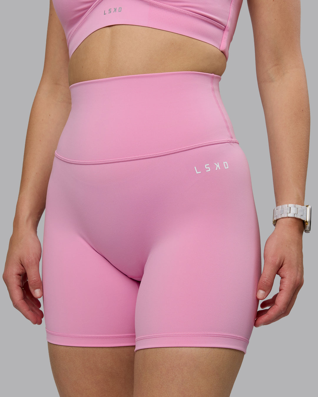 Woman wearing Base 2.0 Ultra High-Rise 6&quot; Short - Bubblegum