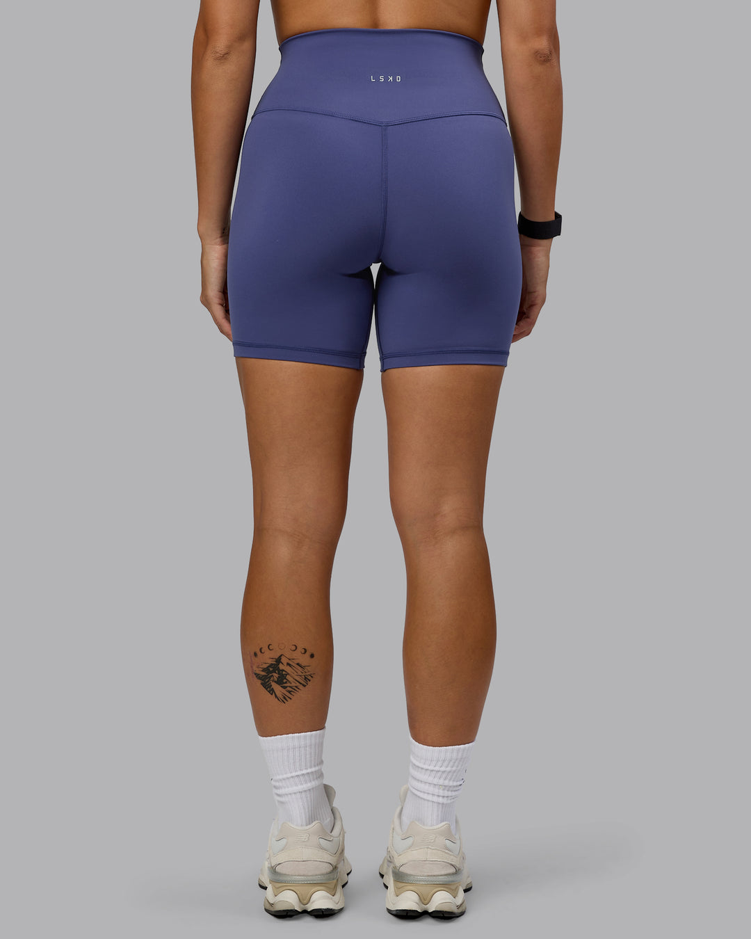 Woman wearing Base 2.0 Ultra High-Rise 6&quot; Short - Future Dusk