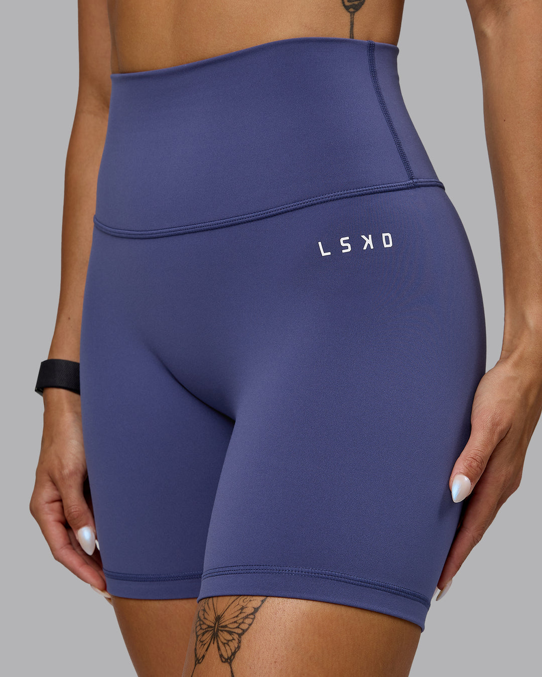 Woman wearing Base 2.0 Ultra High-Rise 6&quot; Short - Future Dusk