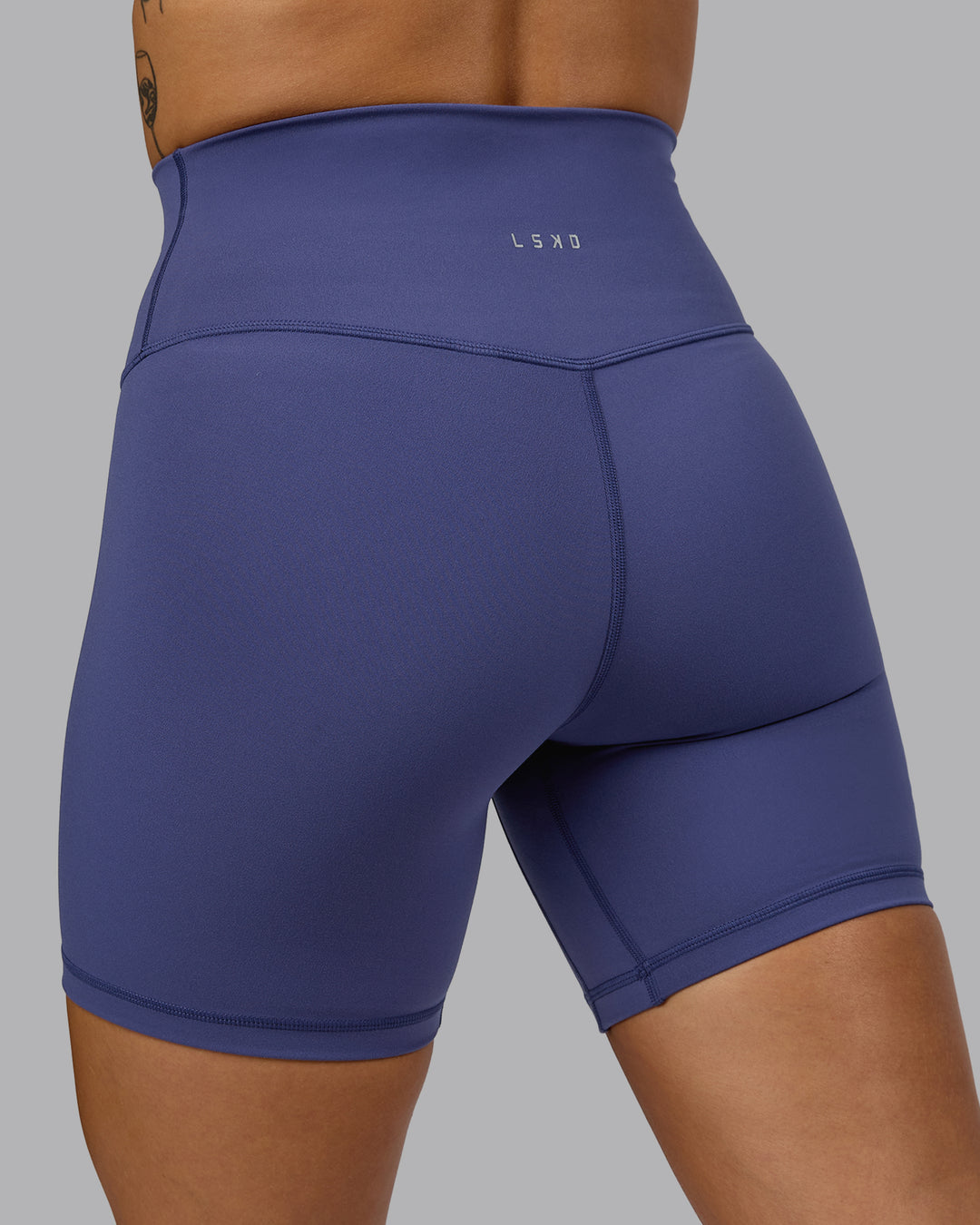 Woman wearing Base 2.0 Ultra High-Rise 6&quot; Short - Future Dusk