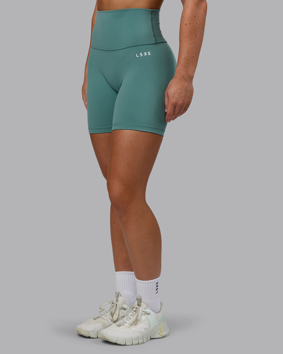 Woman wearing Base 2.0 Ultra High-Rise 6&quot; Short - Sagebrush