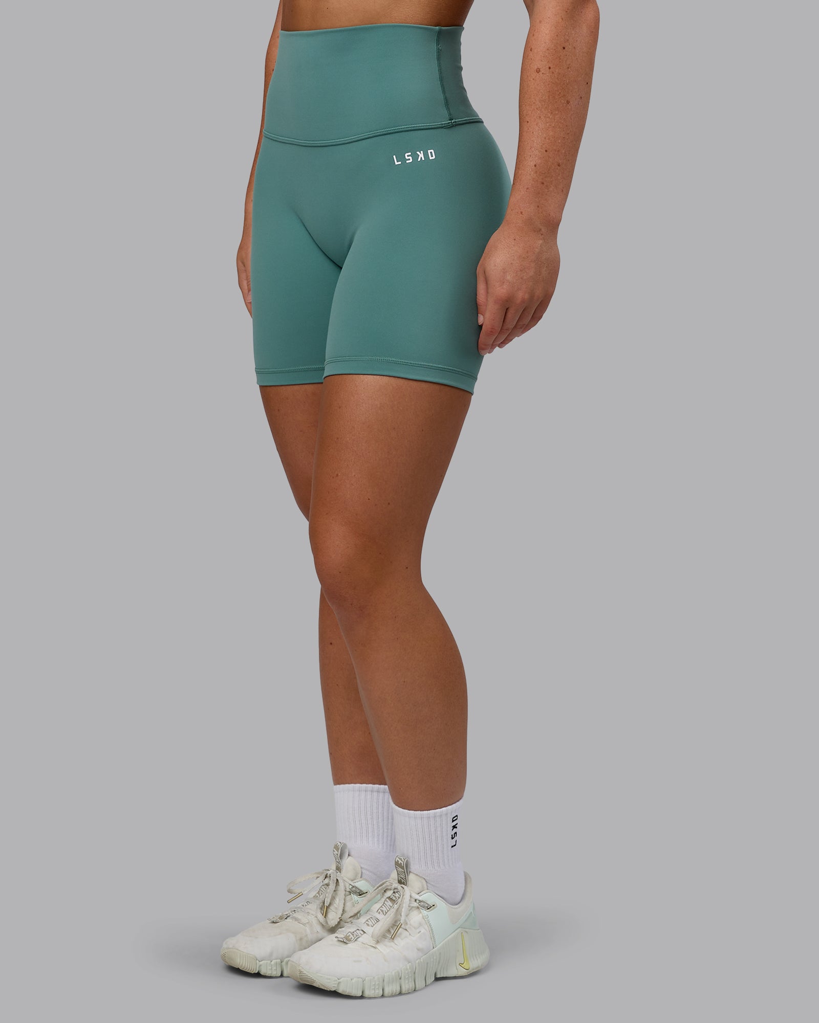Woman wearing Base 2.0 Ultra High-Rise 6" Short - Sagebrush