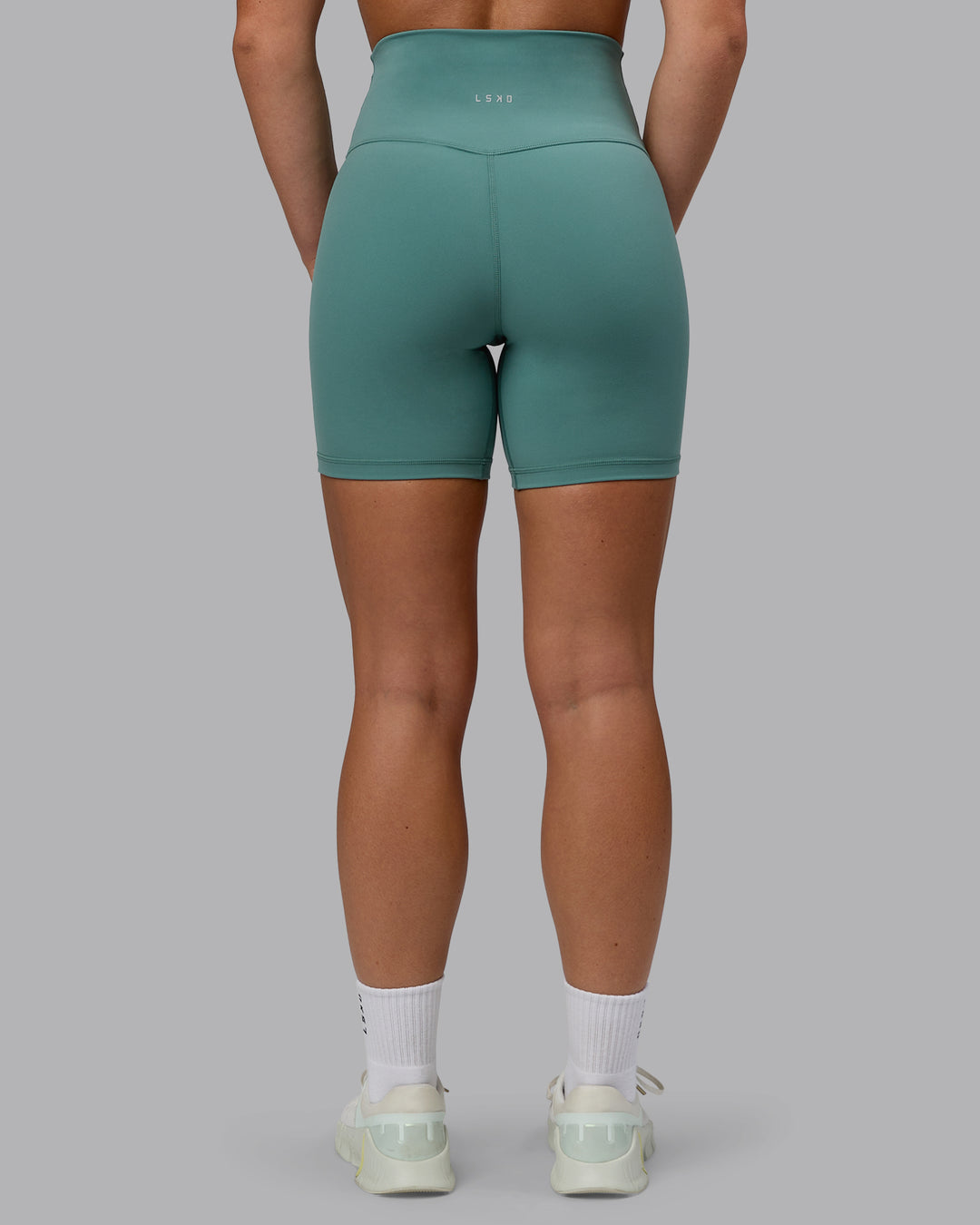 Woman wearing Base 2.0 Ultra High-Rise 6&quot; Short - Sagebrush