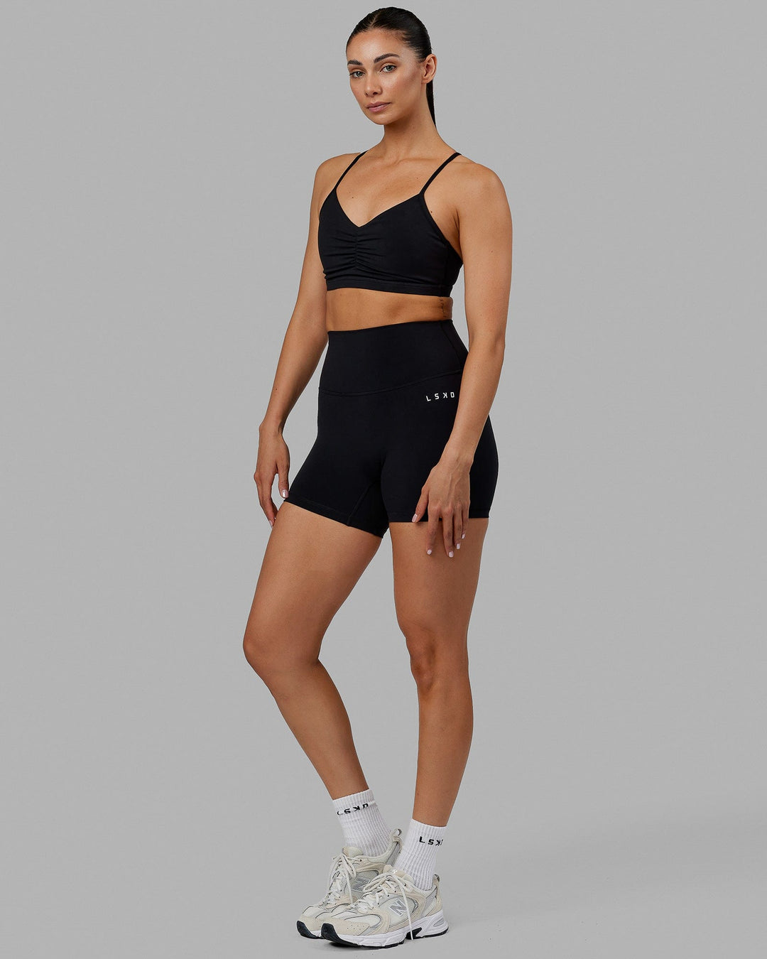 Woman wearing Base 2.0 Ultra High-Rise 4&quot; Short - Black