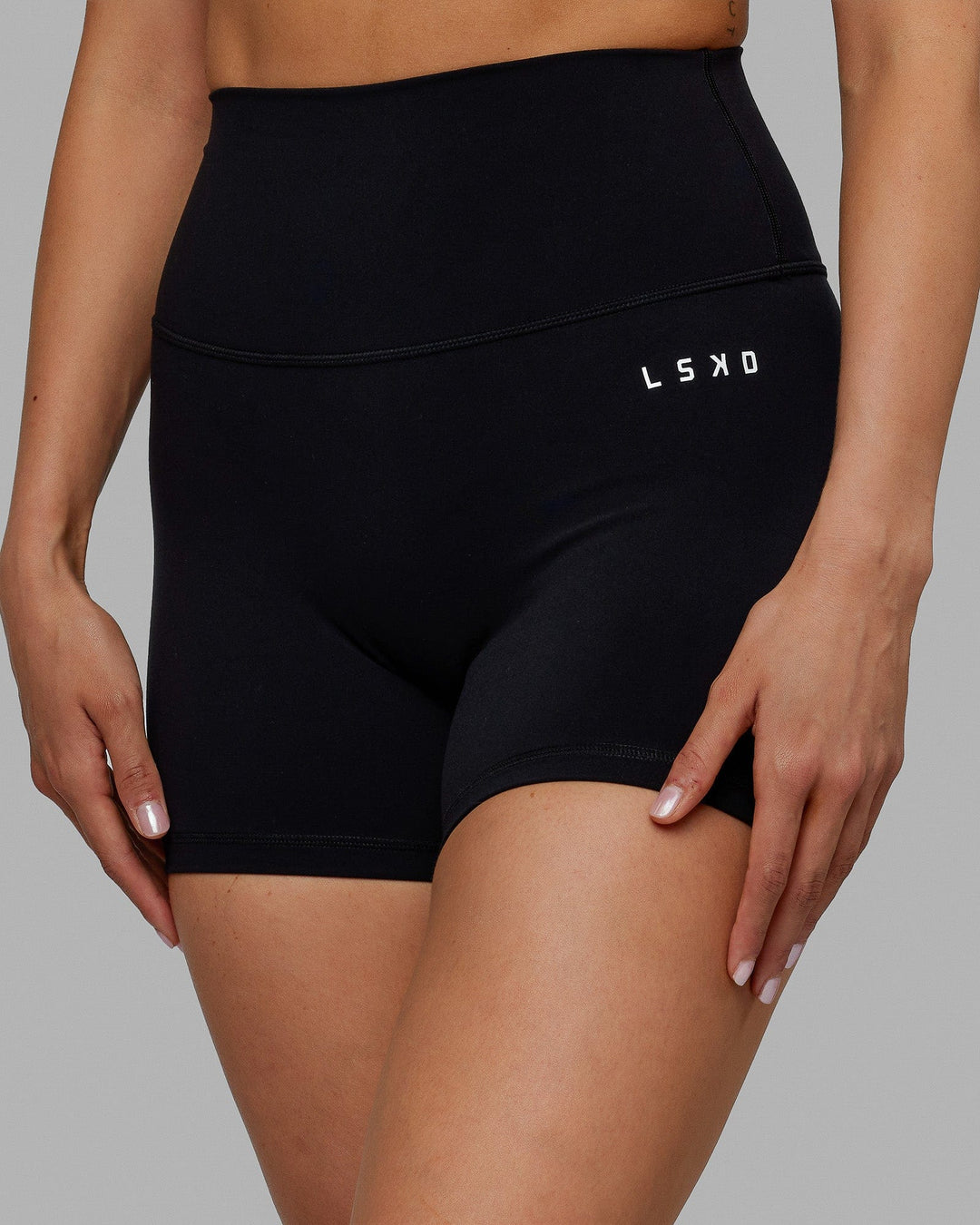 Woman wearing Base 2.0 Ultra High-Rise 4&quot; Short - Black