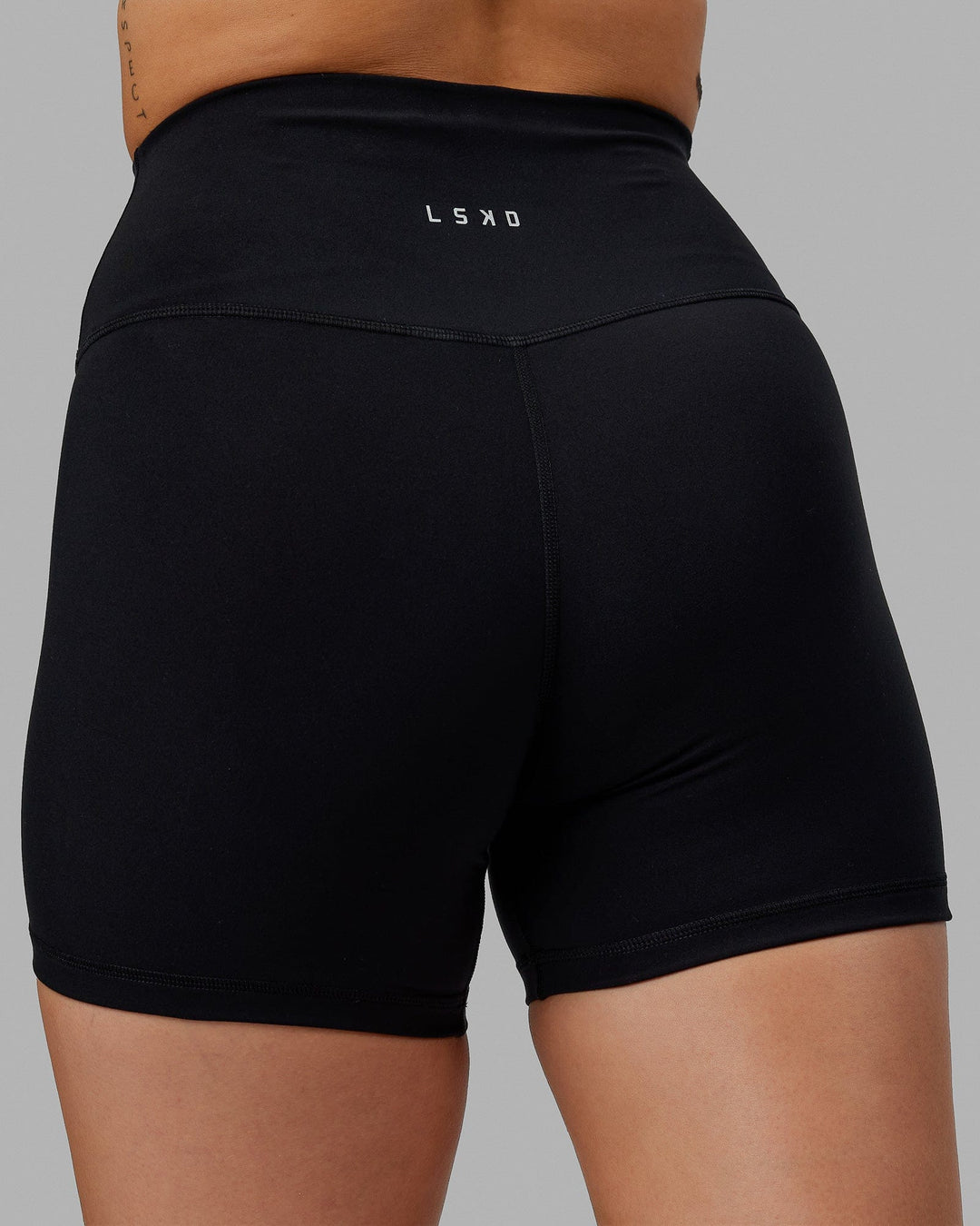 Woman wearing Base 2.0 Ultra High-Rise 4&quot; Short - Black