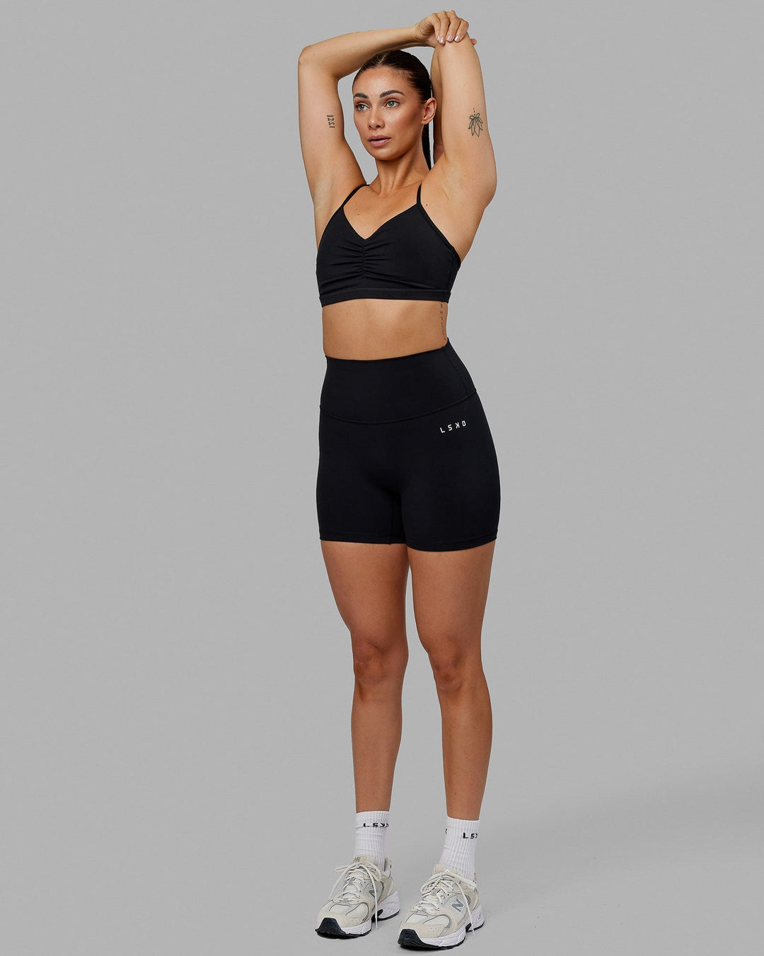 Woman wearing Base 2.0 Ultra High-Rise 4&quot; Short - Black