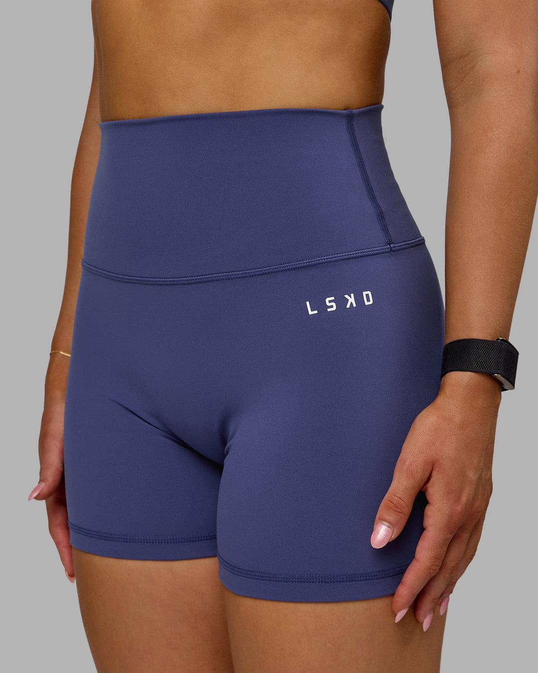 Woman wearing Base 2.0 Ultra High-Rise 4&quot; Short - Future Dusk
