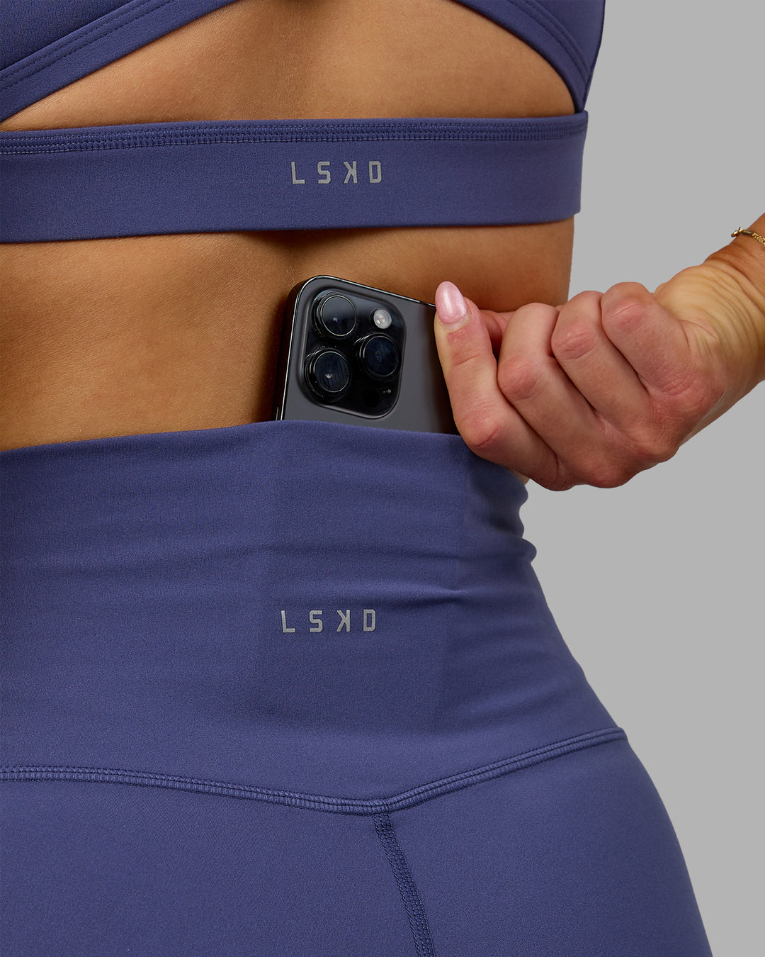 Woman wearing Base 2.0 Ultra High-Rise 4&quot; Short - Future Dusk