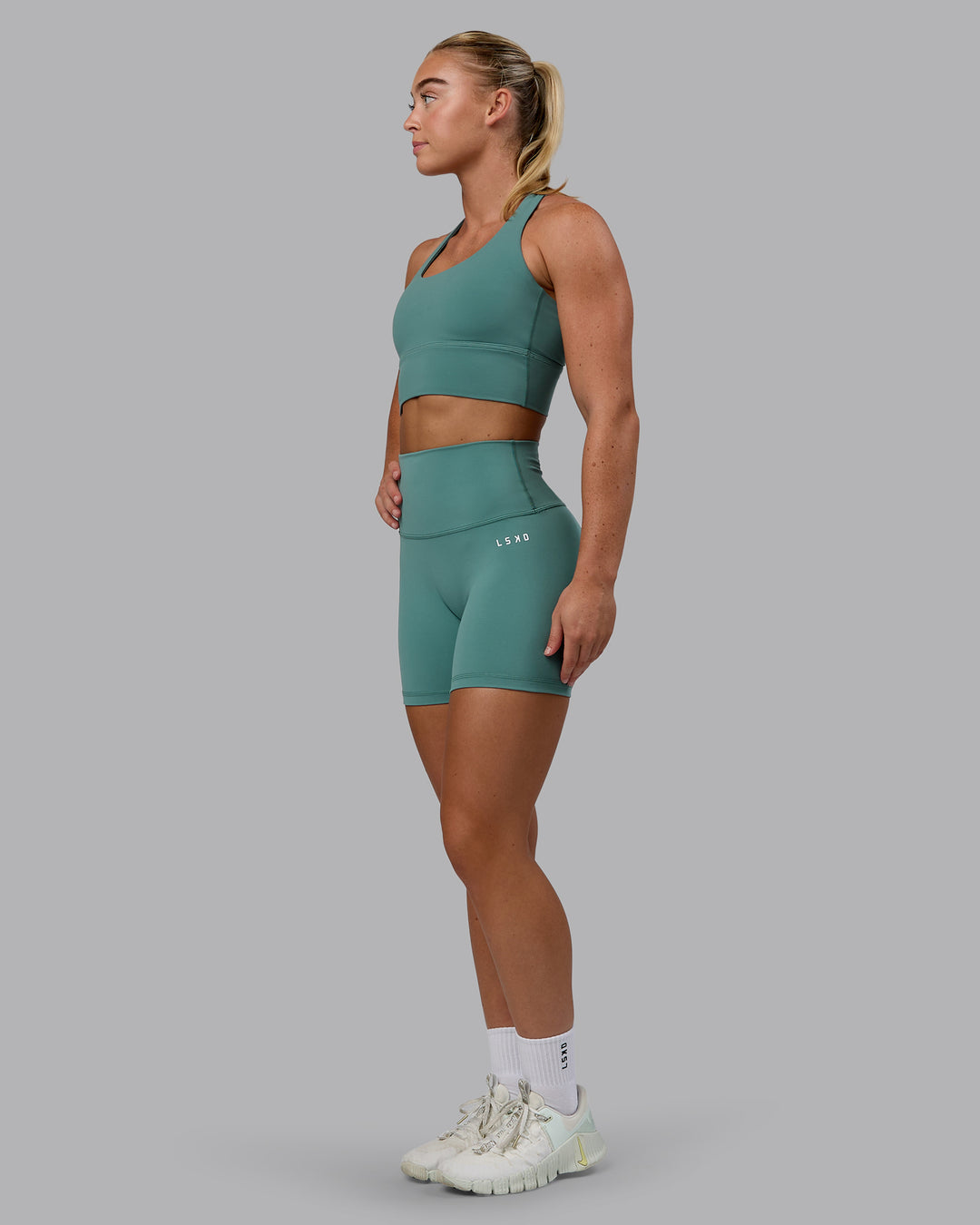 Woman wearing Base 2.0 Ultra High-Rise 4&quot; Short - Sagebrush