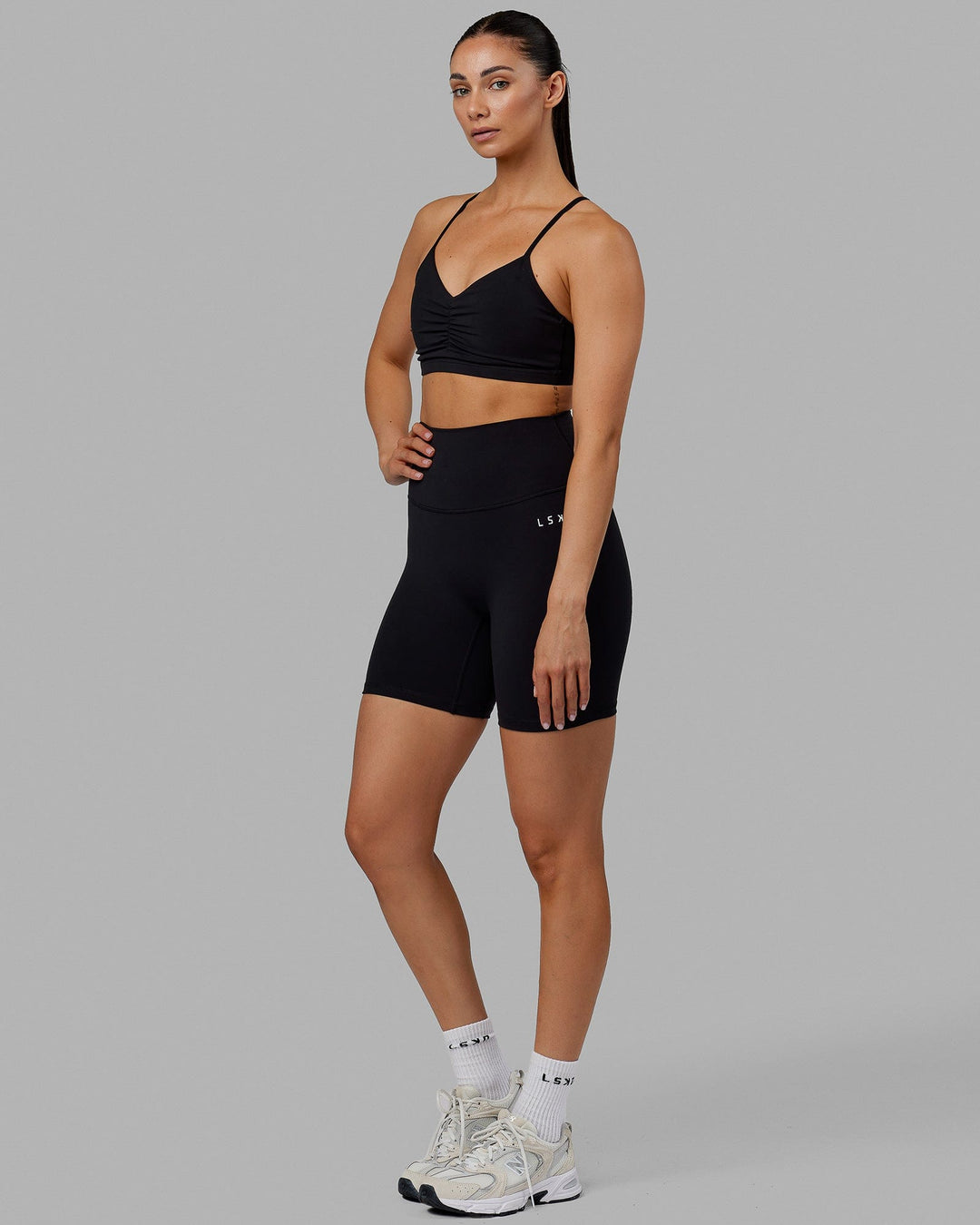 Woman wearing Base 2.0 Ultra High-Rise 6&quot; Short - Black