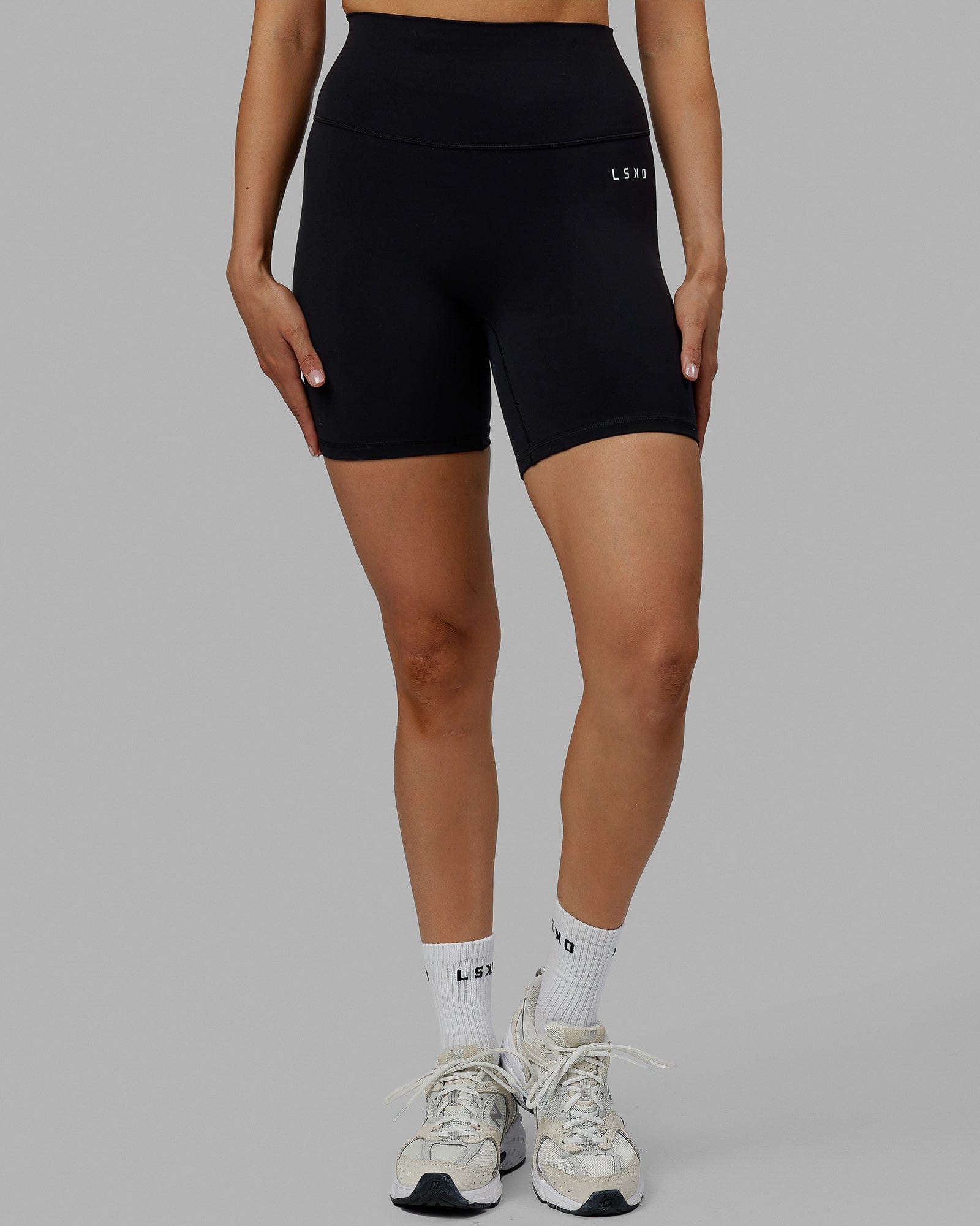 Woman wearing Base 2.0 Ultra High-Rise 6" Short - Black