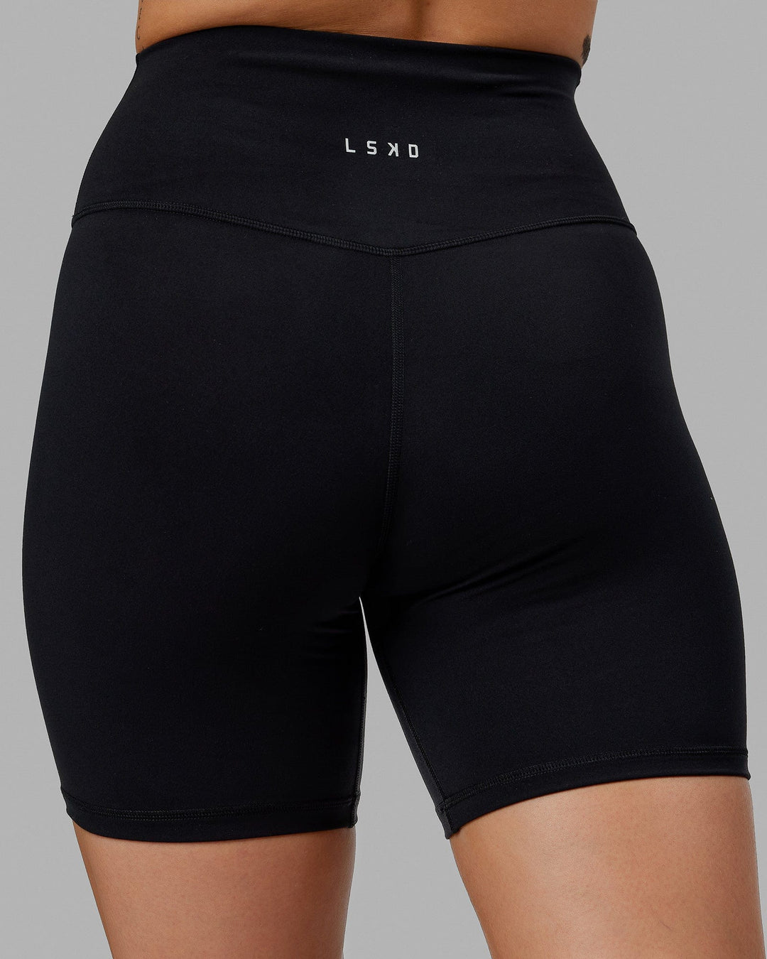 Woman wearing Base 2.0 Ultra High-Rise 6&quot; Short - Black