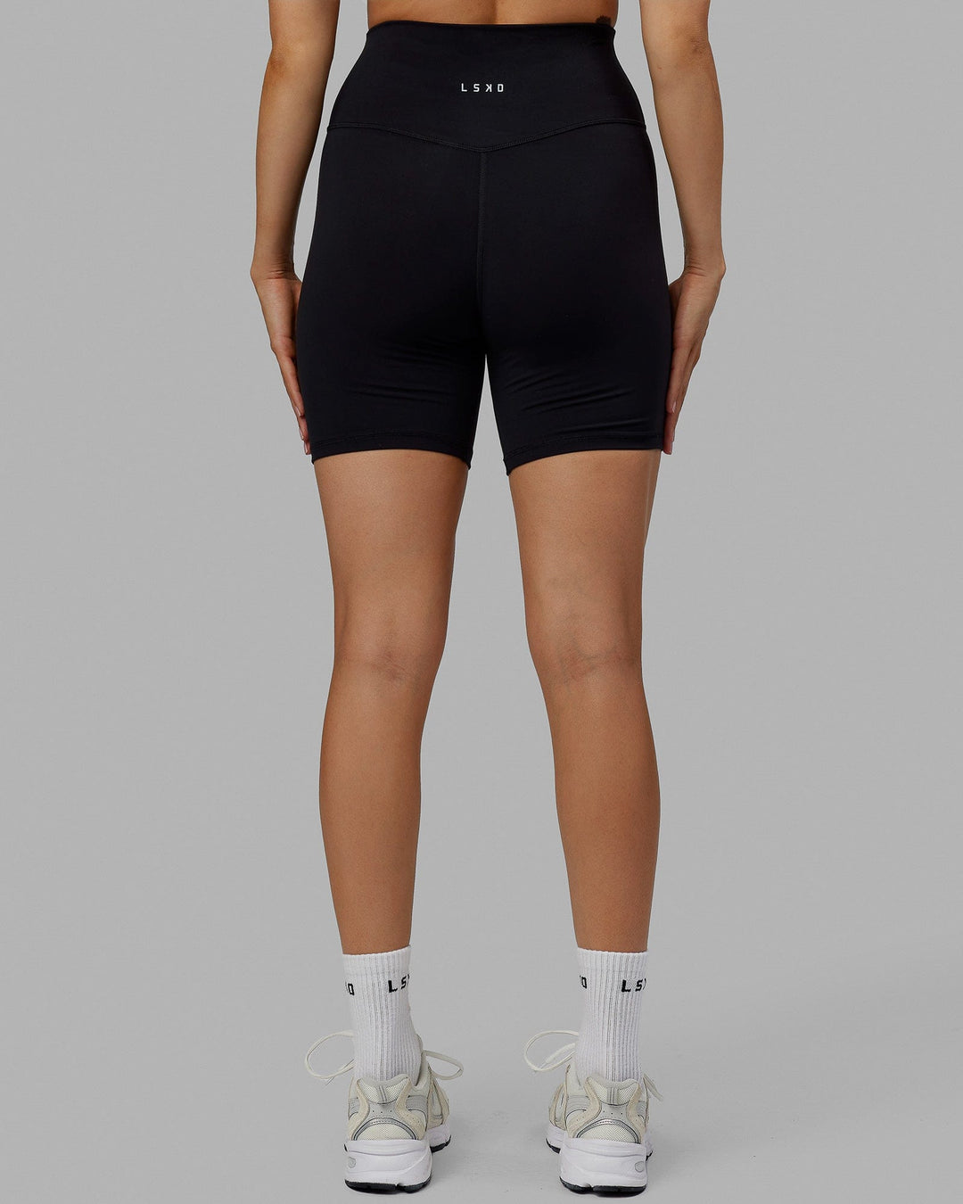 Woman wearing Base 2.0 Ultra High-Rise 6&quot; Short - Black