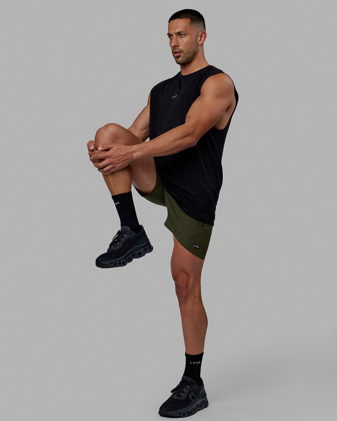 Man wearing Base FLXCotton Tank - Black