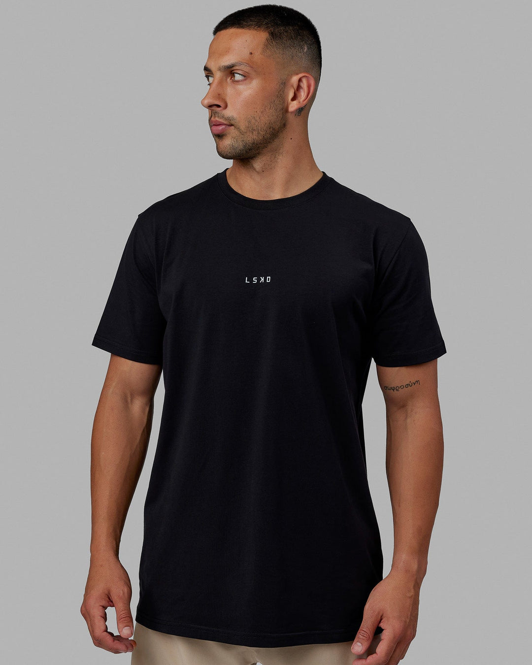 Man wearing Base FLXCotton Tee - Black