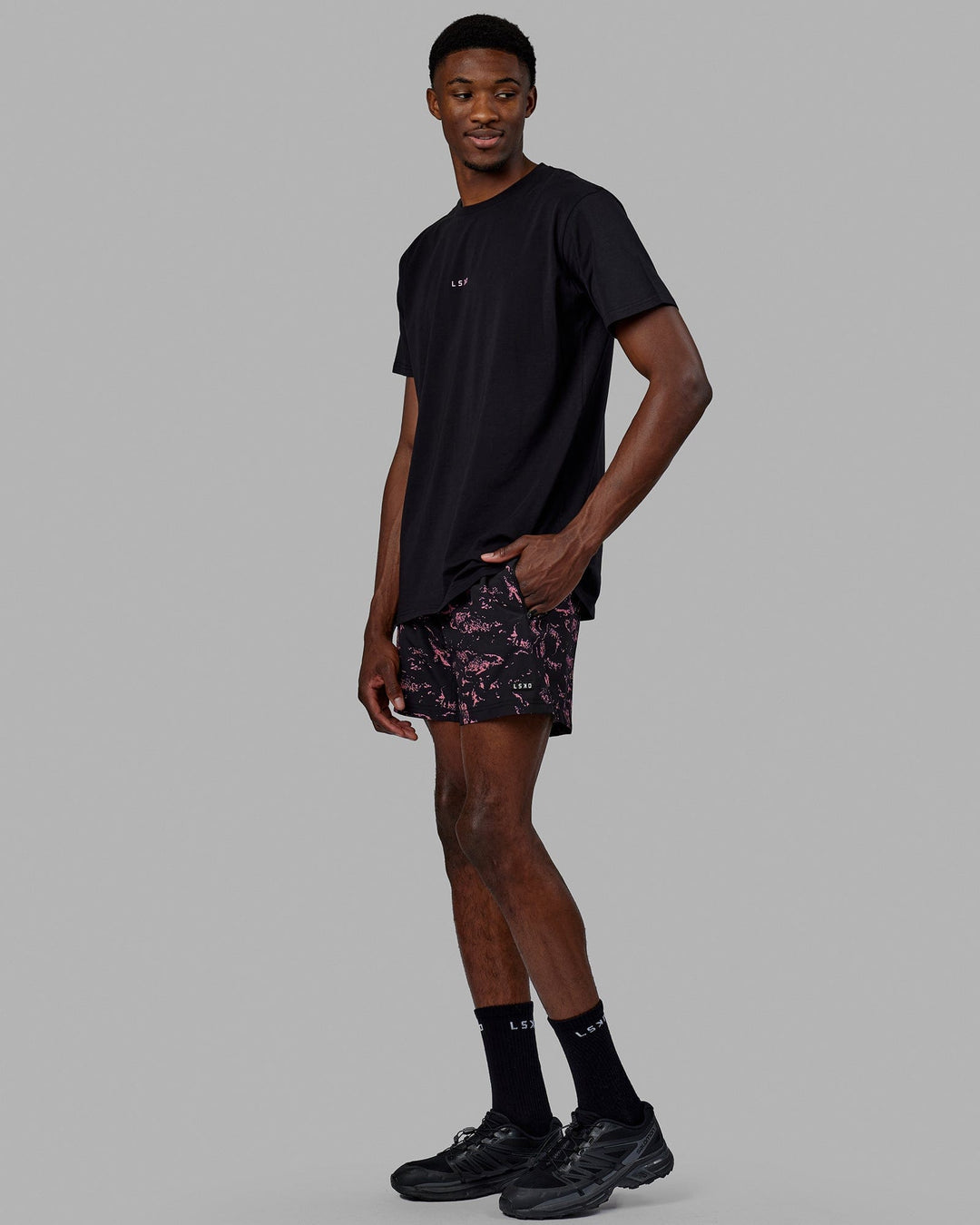 Man wearing Base FLXCotton Tee - Black-Pink Rose