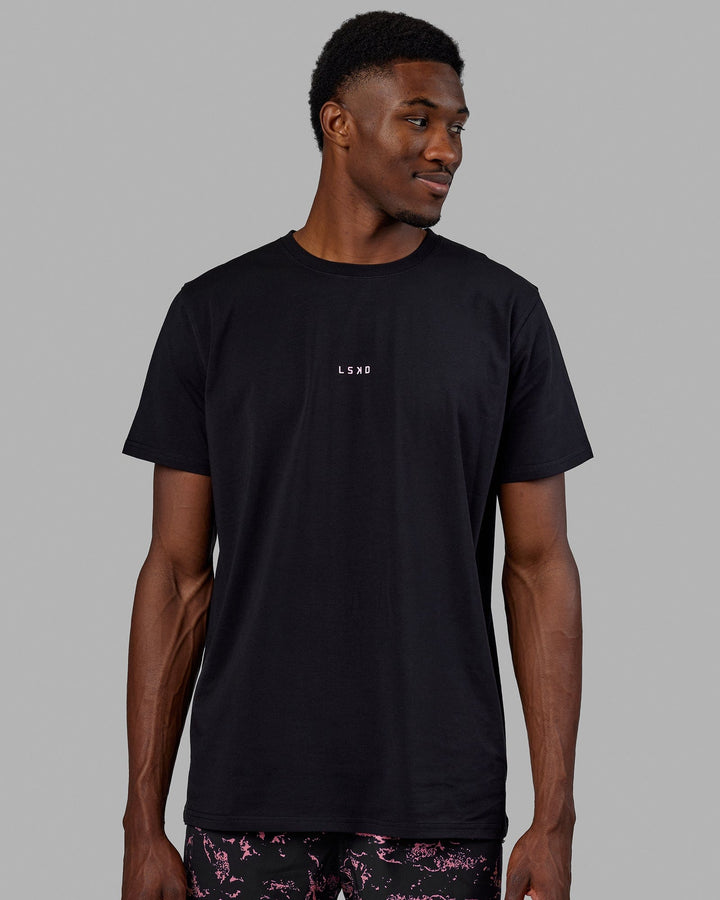 Man wearing Base FLXCotton Tee - Black-Pink Rose