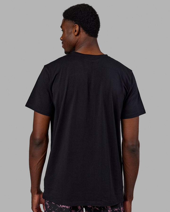 Man wearing Base FLXCotton Tee - Black-Pink Rose